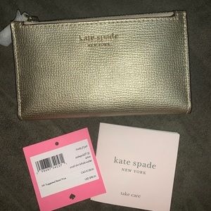 !! SOLD!! Kate Spade Gold Slim Bifold Wallet